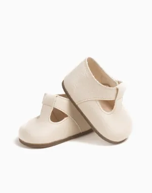 Bambinis – Pair of cream “T-strap” shoes
