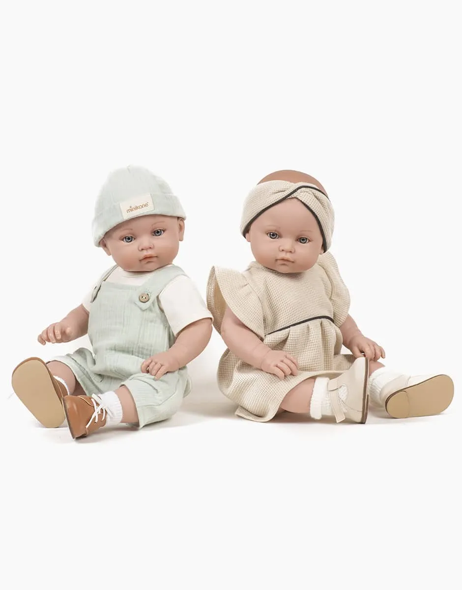 Bambinis – Pair of cream “T-strap” shoes