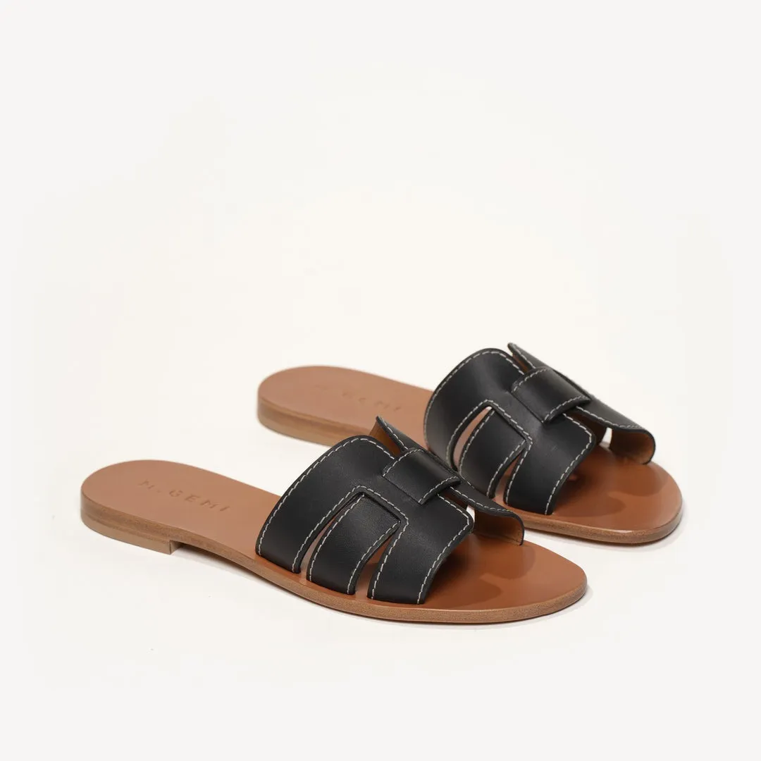 Quintessential Technique leather sandal.