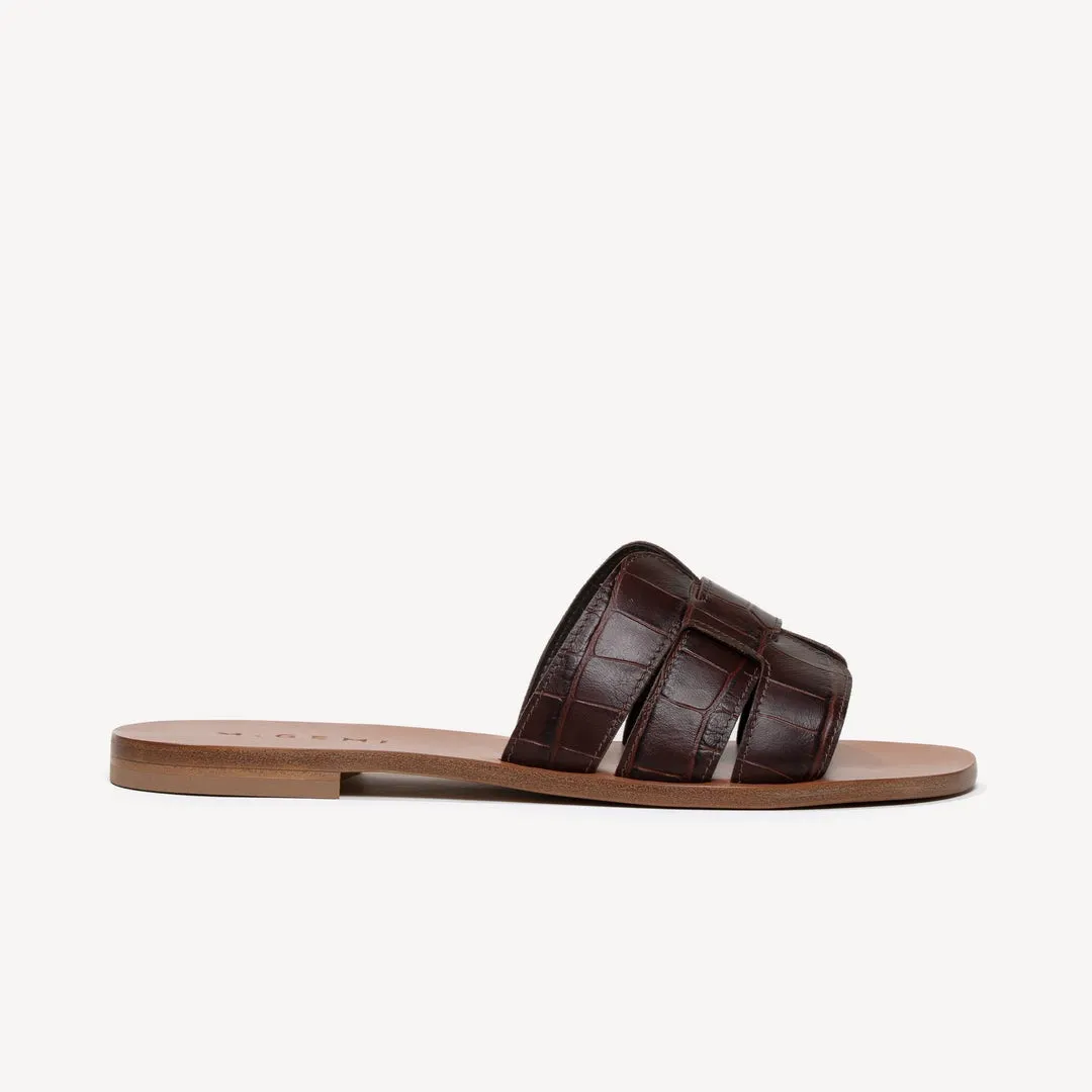 Quintessential Technique leather sandal.